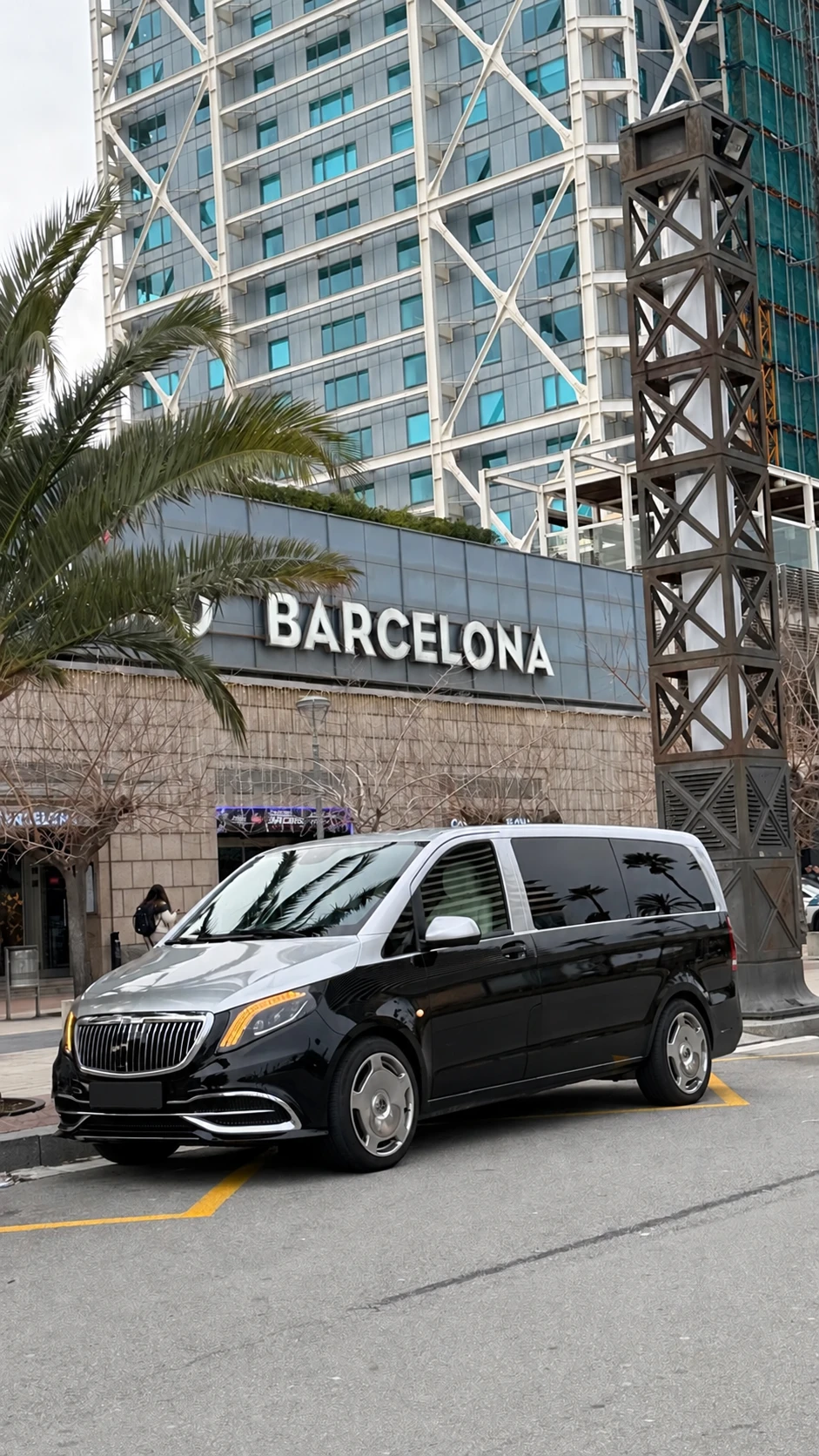 Silver and black van in Barcelona with registration concealed