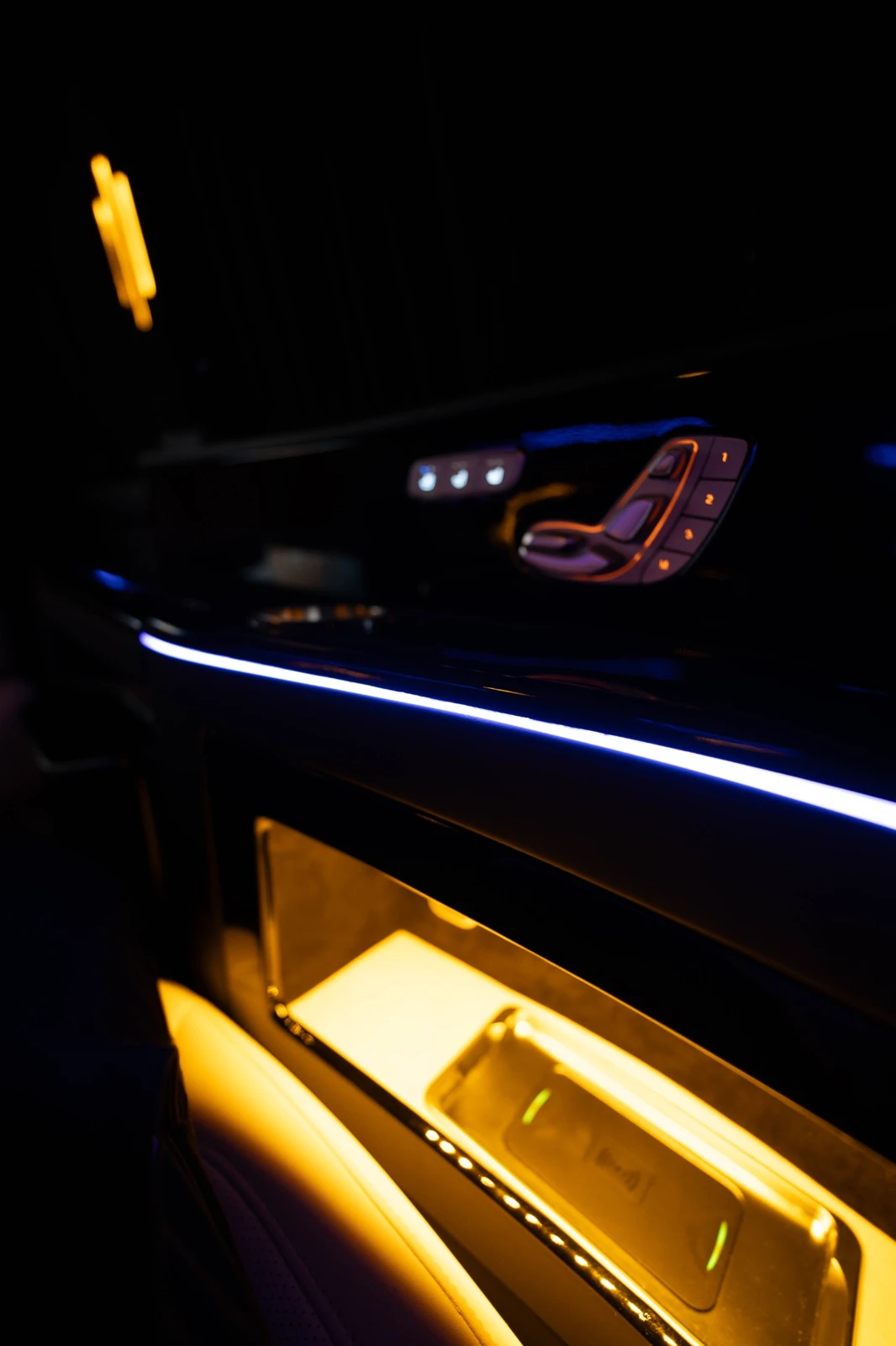 Seat controls and illuminated console in the AFM LUXURY van